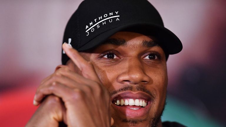 LONDON, ENGLAND - JANUARY 16:   Anthony Joshua  speaks during an Anthony Joshua and Joseph Parker Press Conference at the Dorchester Hotel on January 16, 2