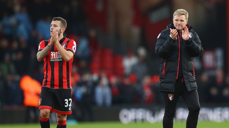 Eddie Howe  with Jack Wilshere during the Arsenal midfielder's on loan spell with Bournemouth last season