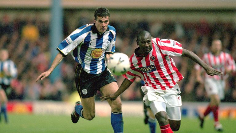 1 Nov 2000:  Gerald Sibon of Sheffield Wednesday challenges Gus Uhlenbeek of Sheffield United during the Worthington Cup third round match at Hillsborough