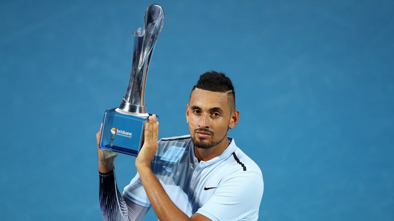 BRISBANE, AUSTRALIA - JANUARY 07:  Nick Kyrgios of Australia holds the winners trophy after the Men's Final match against Ryan Harrison of the USA during d