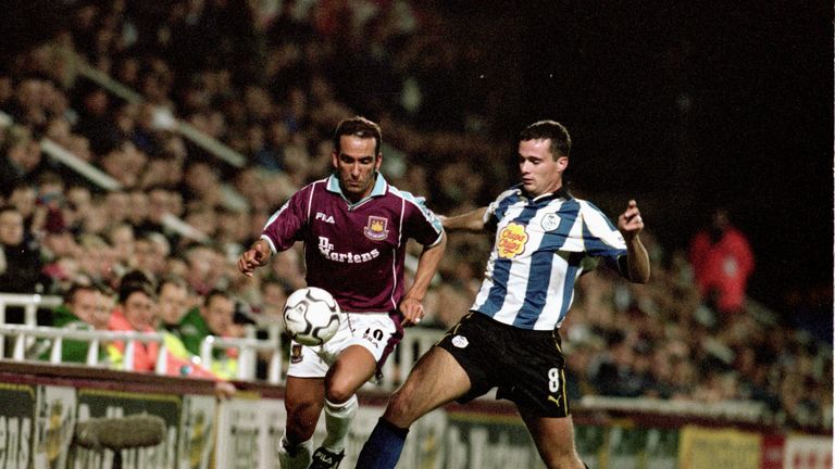 29 Nov 2000: Paolo Di Canio of West Ham takes the ball past Gerald Sibon of Sheffield Wednesday during the Worthington Cup fourth round match at Upton Park