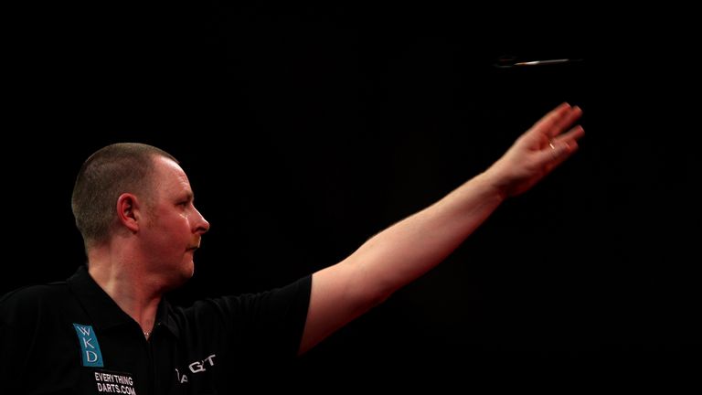 LONDON, ENGLAND - DECEMBER 27:  Alan Tabern of England throws in his match against Paul Nicholson of England during Day 10 of the 2012 Ladbrokes.com World 
