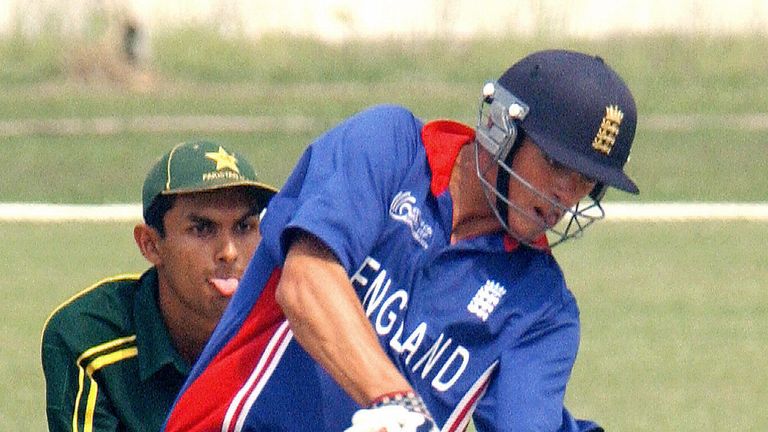FATULLAH, BANGLADESH:  England under 19 cricket team's batsman Alastair N. Cook (R) hits a ball off Pakistani bowler Mansoor Amjad (not in the picture) as 