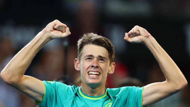 Alex De Minaur of Australia celebrates winning his match against Milos Raonic of Canada during day four of the 2018 Brisbane International