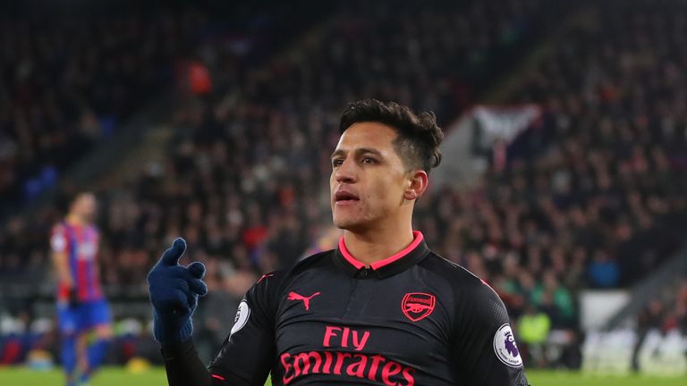 LONDON, ENGLAND - DECEMBER 28: Alexis Sanchez of Arsenal celebrates after scoring his sides third goal during the Premier League match between Crystal Pala