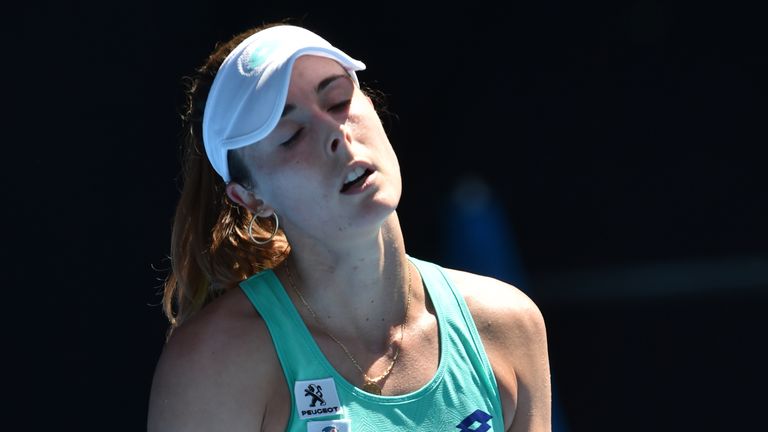 France's Alize Cornet reacts while playing against Belgium's Elise Mertens during their women's singles third round match on day five of the Australian Ope