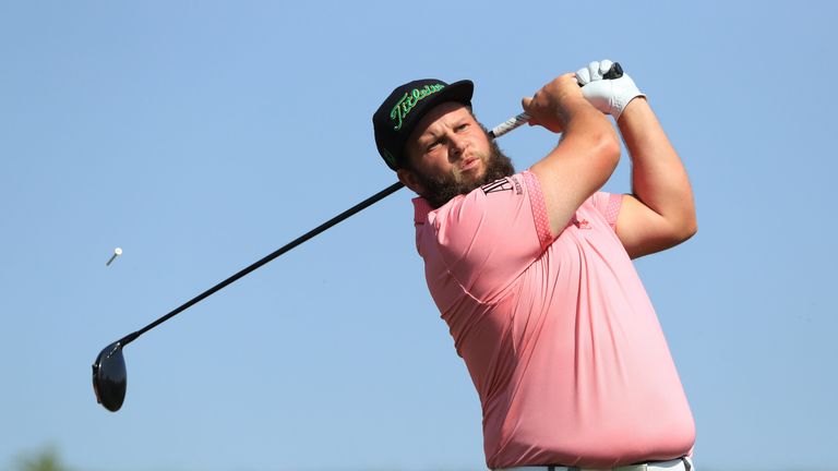 Andrew Johnston of England plays his shot from the third tee during round three of the Abu Dhabi HSBC Golf Championship