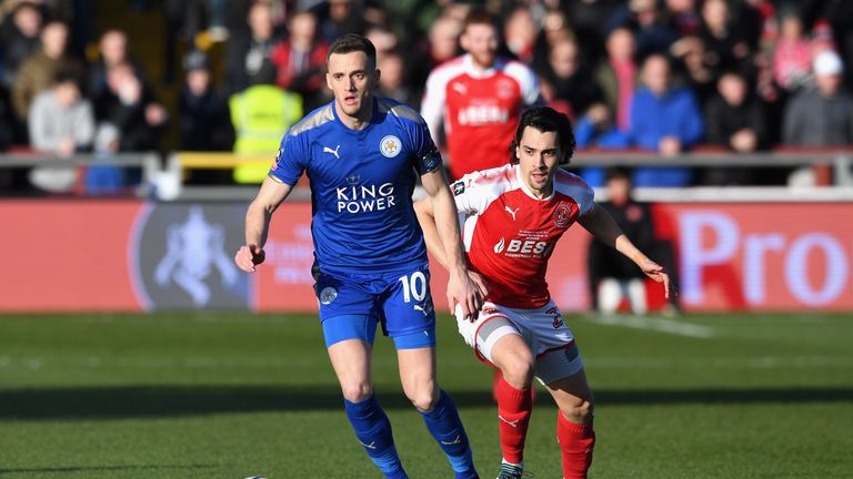 Andy King of Leicester City and Markus Schwabl of Fleetwood Town in action during The Emirates FA Cup