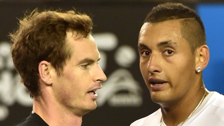 Britain's Andy Murray (L) embraces after victory in his men's singles match against Australia's Nick Kyrgios (R) on day nine of the 2015 Australian Open