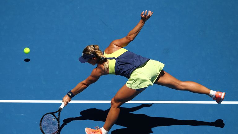 MELBOURNE, AUSTRALIA - JANUARY 16:  Angelique Kerber of Germany plays a forehand in her first round match against Anna-Lena Friedsam of Germany on day two 