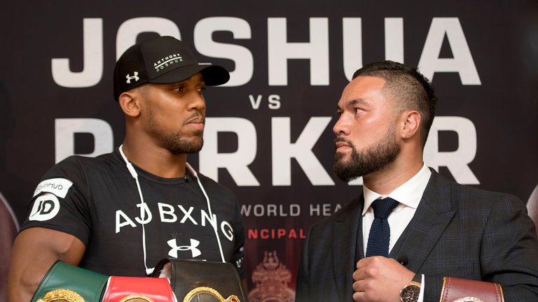 Anthony Joshua and Joseph Parker pose for a photo during the press conference at the Dorchester Hotel in London