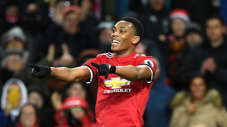 MANCHESTER, ENGLAND - JANUARY 15:  Anthony Martial of Manchester United celebrates scoring his side's second goal during the Premier League match between M