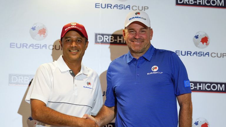 KUALA LUMPUR, MALAYSIA - JANUARY 09: Arjun Atwal captain of team Asia and Thomas Bjorn captain of team Europe shakes hands during the press conference ahea
