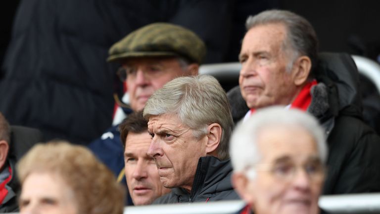 A grim-faced Arsene Wenger serves the final game of his touchline ban during Arsenal's defeat at Bournemouth