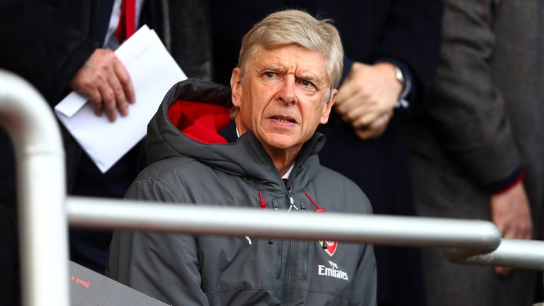 Arsene Wenger watches from the stands as Arsenal lose 2-1 to Bournemouth in the Premier League.