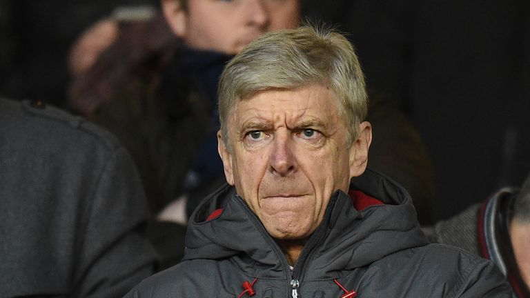 Arsenal's French manager Arsene Wenger looks on from the stands during the English FA Cup third round football match between Nottingham Forest and Arsenal 