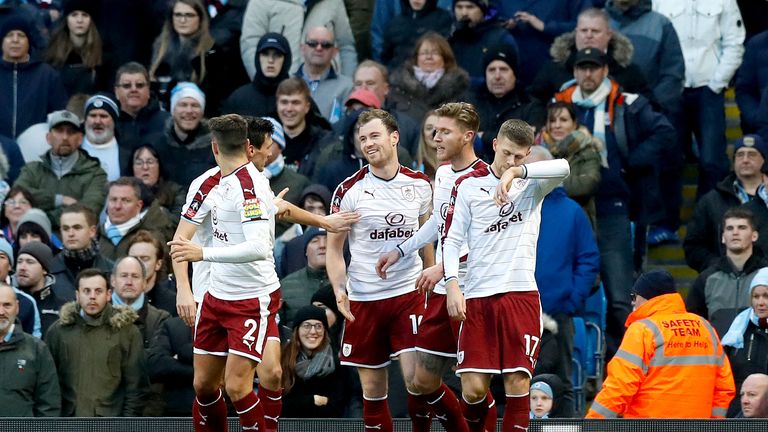 Burnley's Ashley Barnes (centre) celebrates scoring his side's first goal of the game during the FA Cup third round match at Manchester City