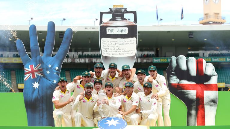 SYDNEY, AUSTRALIA - JANUARY 08:  The Australian team celebrate winning the Ashes series with the trophy during day five of the Fifth Test match in the 2017