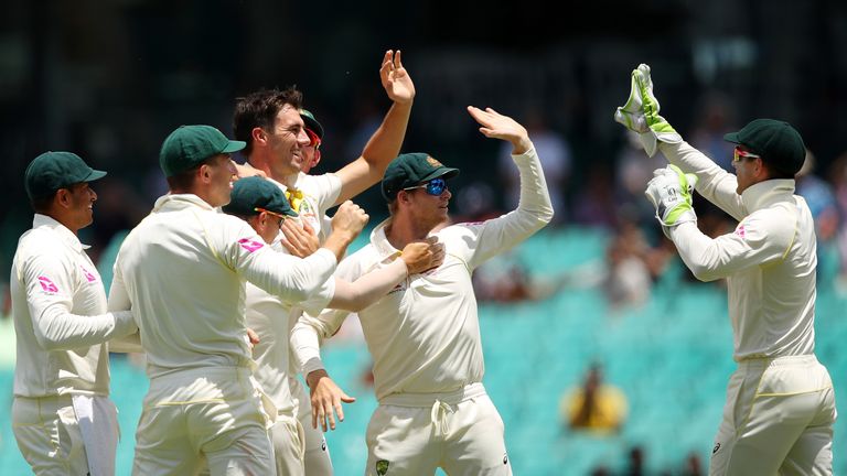 SYDNEY, AUSTRALIA - JANUARY 08:  Pat Cummins of Australia celebrates dismissing Stuart Broad of England during day five  of the Fifth Test match in the 201