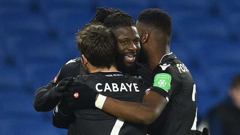 Crystal Palaces French-born Malian midfielder Bakary Sako (C) celebrates scoring his team's first goal with teammates during the English FA Cup third round