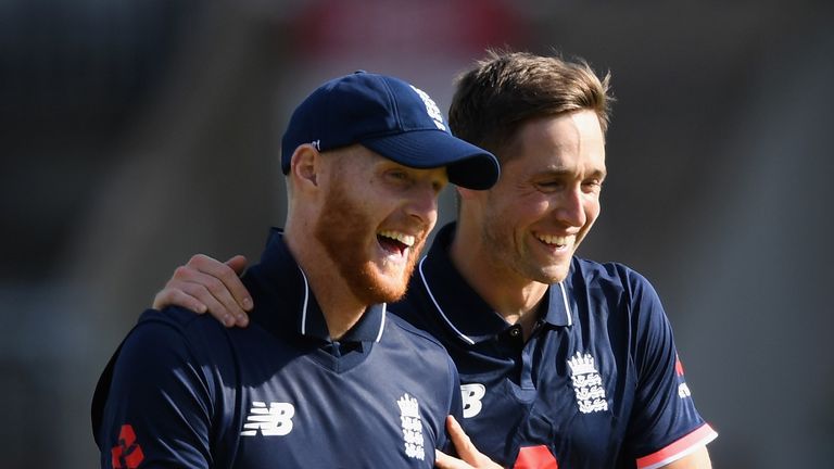 MANCHESTER, ENGLAND - SEPTEMBER 19:  Chris Woakes of England celebrates with Ben Stokes after dismissing Chris Gayle of the West Indies during the 1st Roya