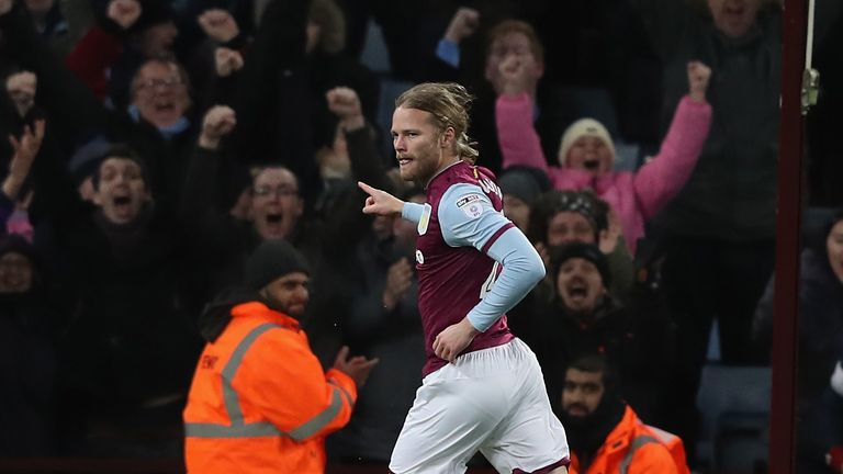 Birkir Bjarnason of Aston Villa celebrates after scoring their fourth goal during the Sky Bet Championship match against Bristol City