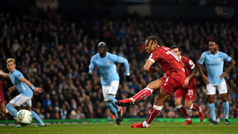 Bobby Reid of Bristol City scores their first goal from the penalty spot during the Carabao Cup Semi-Final First Leg