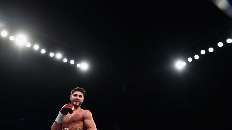 Josh Kelly of England celebrates after defeating Jose Luis Zuniga of Mexico during their Welterweight contest in Belfast