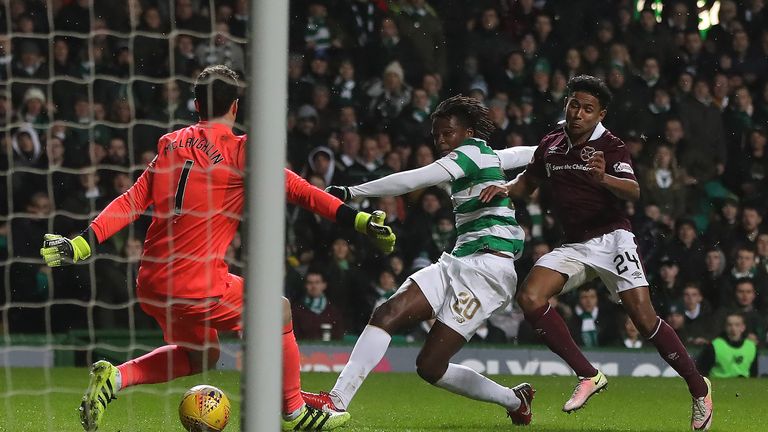 GLASGOW, SCOTLAND - JANUARY 30:  Dedryck Boyata of Celtic scores his team's second goal during the Scottish Premier League match between Celtic and Heart o