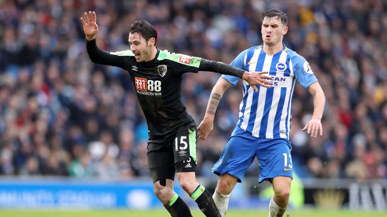 Brighton's Pascal Gross (right) and Bournemouth's Adam Smith battle for the ball 