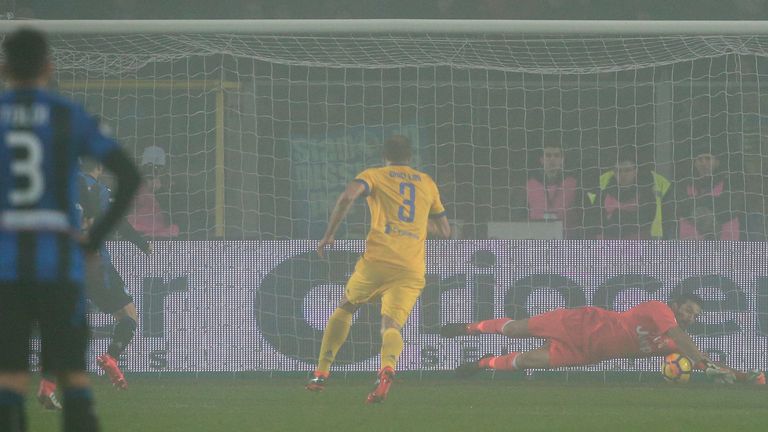 BERGAMO, ITALY - JANUARY 30:  Gianluigi Buffon (R) of Juventus FC saves a penalty kick on Alejandro Gomez of Atalanta during the TIM Cup match between Atal