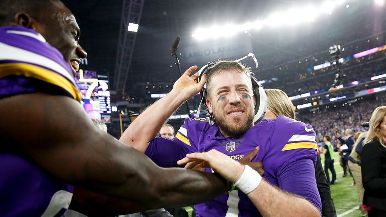 MINNEAPOLIS, MN - JANUARY 14:  Case Keenum #7 of the Minnesota Vikings celebrates wtih teammates after defeating the New Orleans Saints in the NFC Division