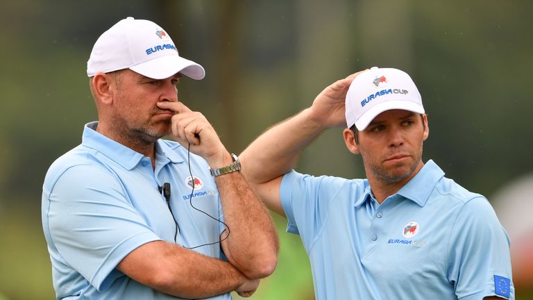 KUALA LUMPUR, MALAYSIA - JANUARY 13:  Europe Captain Thomas Bjorn looks on with Paul Casey during the foursomes matches on day two of the 2018 EurAsia Cup 