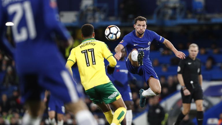Chelsea's English midfielder Danny Drinkwater (R) kicks past Norwich City's English midfielder Josh Murphy during the FA Cup third-round replay 