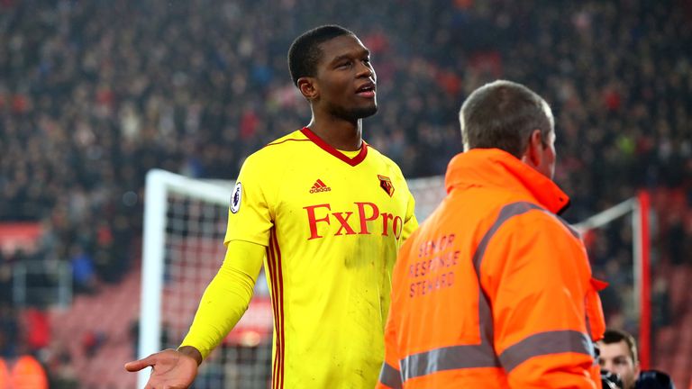 Christian Kabasele of Watford attempts to talk with Watford supporters after the Emirates FA Cup Fourth Round match against Southampton 