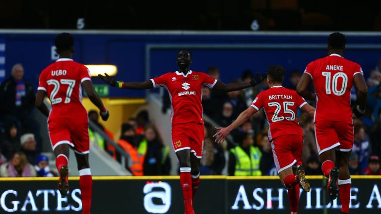 LONDON, ENGLAND - JANUARY 06:  Ousseynou Cisse of MK Dons celebrates scoring his sides first goal during The Emirates FA Cup Third Round match between Quee