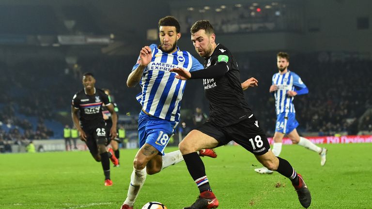 Brighton's English defender Connor Goldson (L) vies with Crystal Palace's Scottish midfielder James McArthur during the English FA Cup third round football