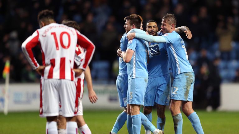 Coventry City players celebrate victory over Stoke after the FA Cup, third round match at the Ricoh Arena, Coventry