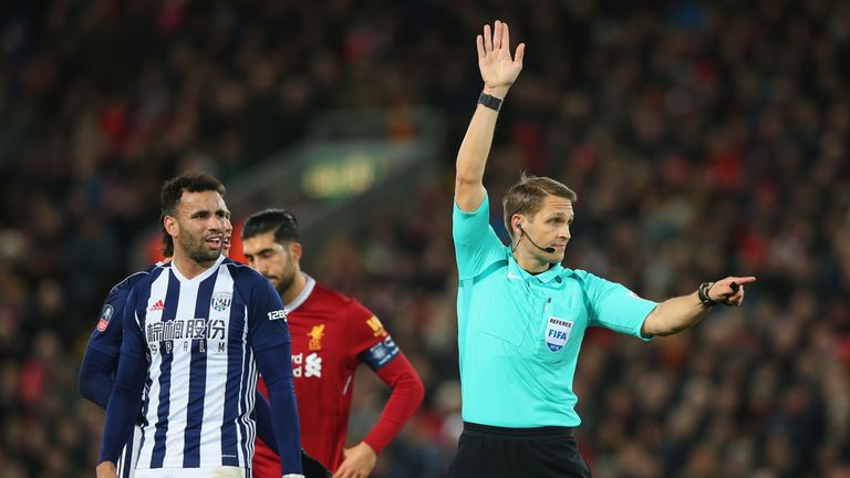 LIVERPOOL, ENGLAND - JANUARY 27:  Referee, Craig Pawson makes a decision via VAR during The Emirates FA Cup Fourth Round match between Liverpool and West B