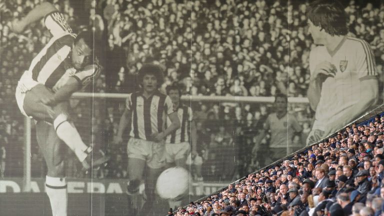 WEST BROMWICH, ENGLAND - JANUARY 30:  A large photo of Cyrille Regis is seen next to the East Stand at The Hawthorns during a memorial service