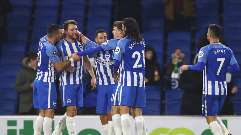 BRIGHTON, ENGLAND - JANUARY 08:  Dale Stephens of Brighton and Hove Albion (2L) celebrates as he scores their first goal with team mates during The Emirate