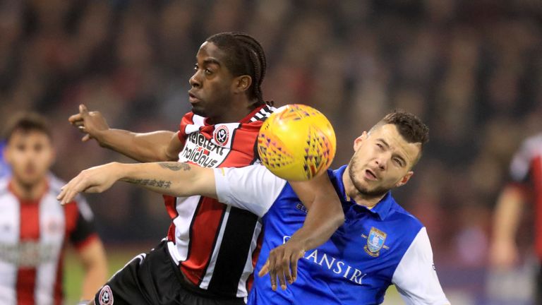 Sheffield Wednesday's Daniel Pudil (right) and Sheffield United's Clayton Donaldson battle for the ball during the Sky Bet Championship match at Bramall La