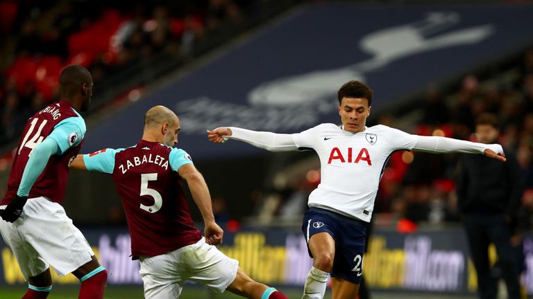 Dele Alli evades the challenge of Pablo Zabaleta