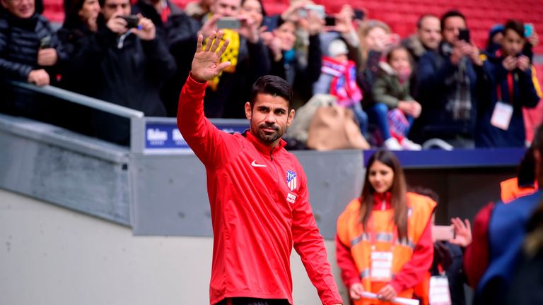 Atletico Madrid's Spanish forward Diego Costa acknowledges supporters 