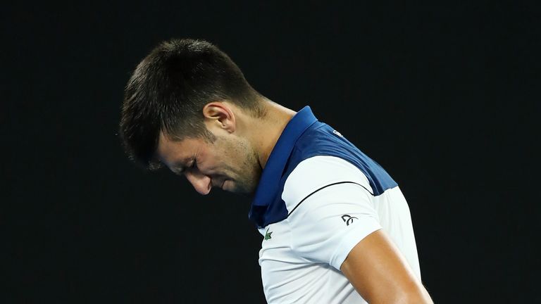 MELBOURNE, AUSTRALIA - JANUARY 22:  Novak Djokovic of Serbia looks dejected in his fourth round match against Hyeon Chung of South Korea on day eight of th