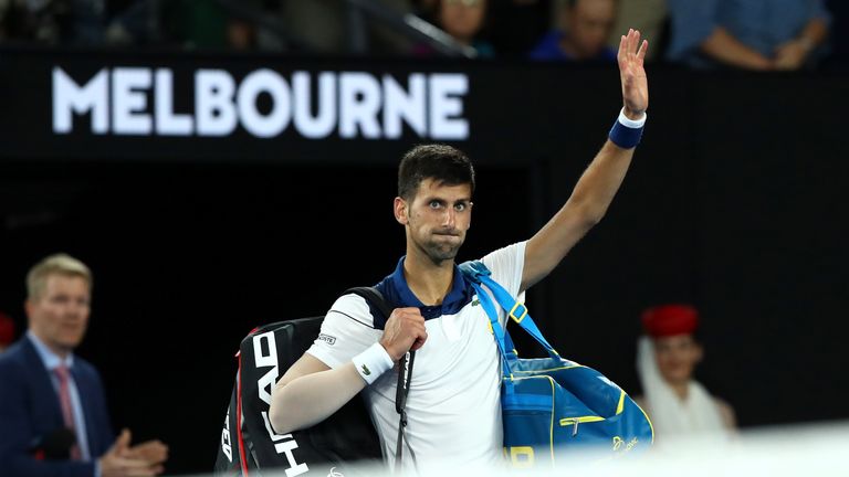 MELBOURNE, AUSTRALIA - JANUARY 22:  Novak Djokovic of Serbia farewells the crowd after losing his fourth round match against Hyeon Chung of South Korea on 