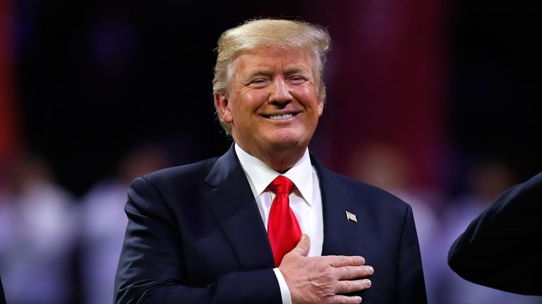 ATLANTA, GA - JANUARY 08:  U.S. President Donald Trump on field during the national anthem prior to the CFP National Championship presented by AT&T between