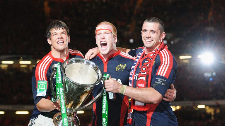 CARDIFF, UNITED KINGDOM - MAY 24:  (L-R) Donncha O'Callaghan, Paul O'Connell and Alan Quinlan of Munster celebrate with the trophy following victory in the