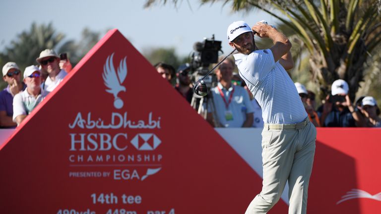 ABU DHABI, UNITED ARAB EMIRATES - JANUARY 19:  Dustin Johnson of the United States plays his shot from the 14th tee during round two of the Abu Dhabi HSBC 