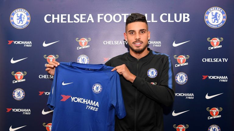 New signing Emerson Palmieri poses with a Chelsea shirt at Stamford Bridge on January 30, 2018